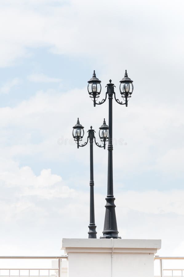 Street lamp retro on blue sky royalty free stock photography