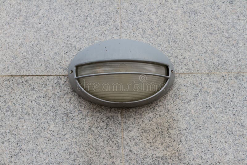 Street lamp on the wall stock photo. Image of lighting 82551628