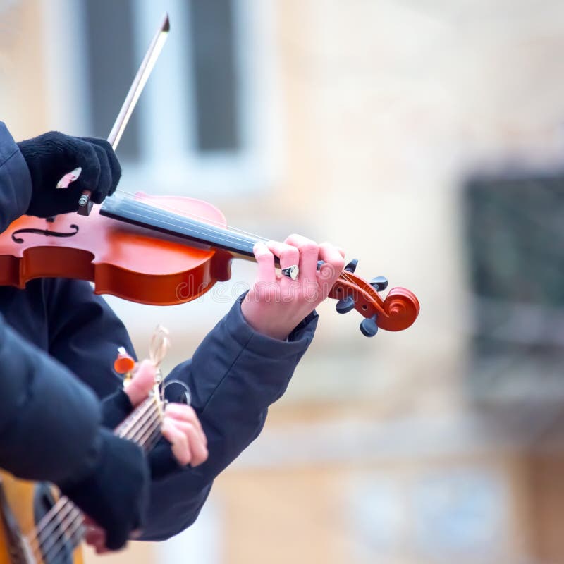 Street Musician Playing the Violin. Musical Creativity Stock Image