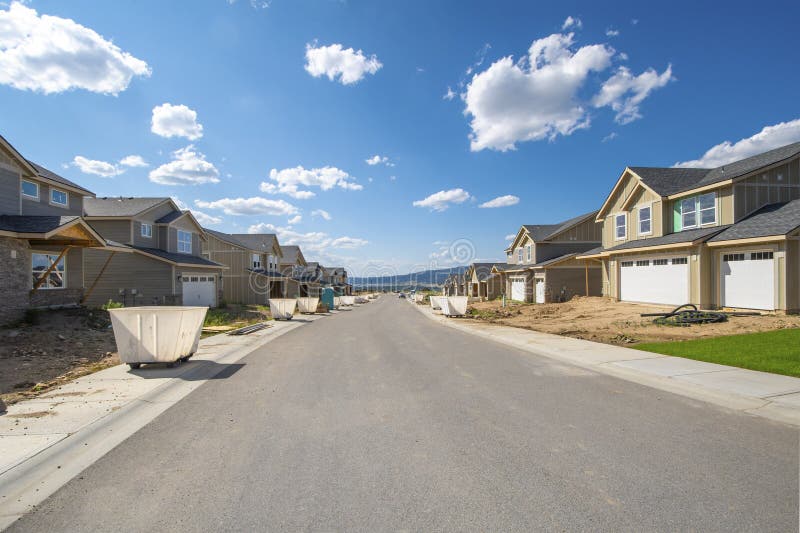 A street of new homes being built in a residential subdivision in Spokane, Washington, USA stock photo A street of new homes being built in a residential subdivision in Spokane, Washington, USA stock photo