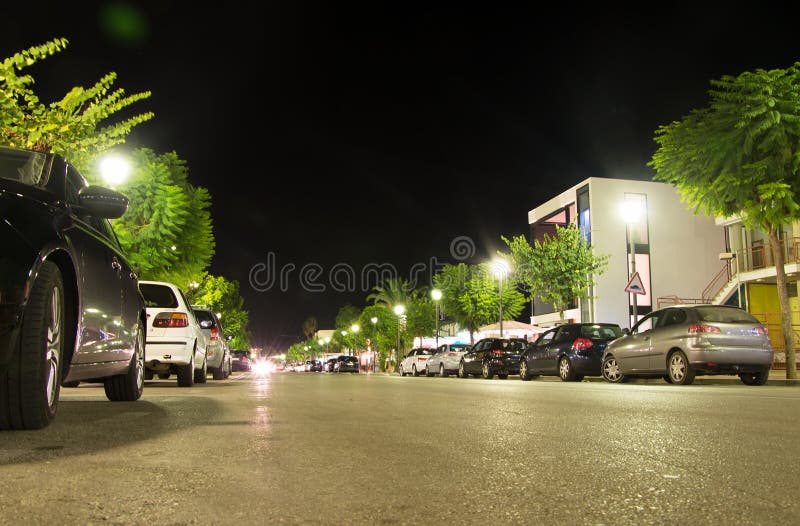 Street with parked cars.