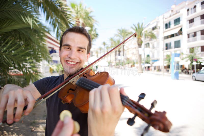 Street Performer Playing Violin Being Paid Money Stock Photo Image of