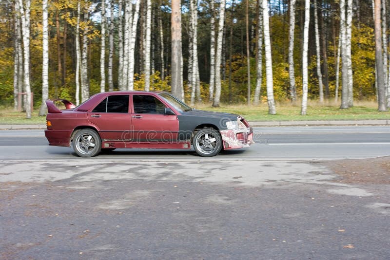 Street race crushed beaten car