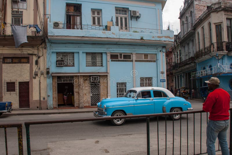 Street Scene With Classic Old Cars And Traditional Colorful Buildings In Downtown Havana Cuba