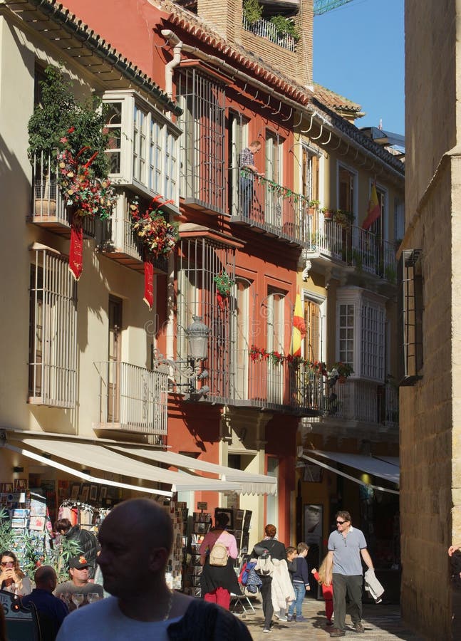 Narrow street in the old part of the Andalusian city of Malaga, Spain