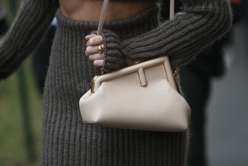 Street Style Outfit, Fashionable Woman Wearing a Fendi Outfit on the  Streets of Milan, Italy Editorial Photo - Image of fendi, clutch: 234569866