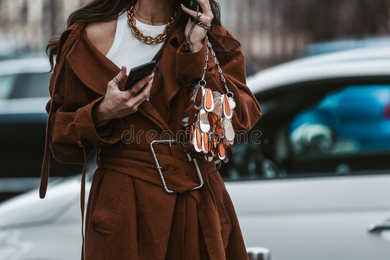 Woman with Louis Vuitton Bag in Brown and Blue Colors before Giorgio Armani  Fashion Show, Milan Fashion Week Editorial Photo - Image of beige, outfit:  195187086