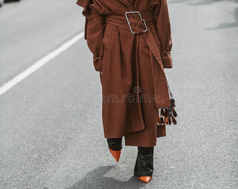 Woman with brown Fendi dress and pink leather bag before Emporio Armani  fashion show, Milan Fashion Week street style – Stock Editorial Photo ©  AndreaA. #326226698