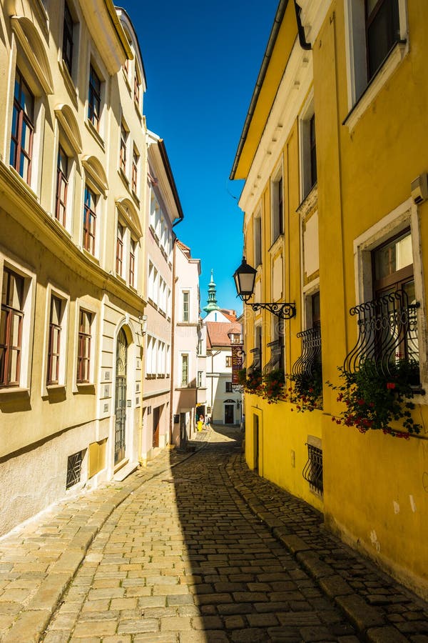 A street with traditional buildings in Bratislava, Slovakia.