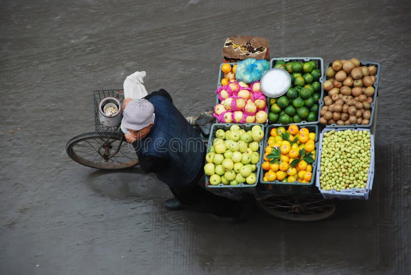 Street vendor is selling fruit in DaYin,Sichuan,China. Fruit scene stock images, royalty-free photos and pictures