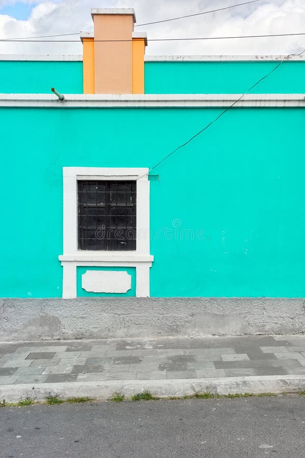 Street view of a colonial building facade, architecture background, Riobamba, Ecuador royalty free stock photo