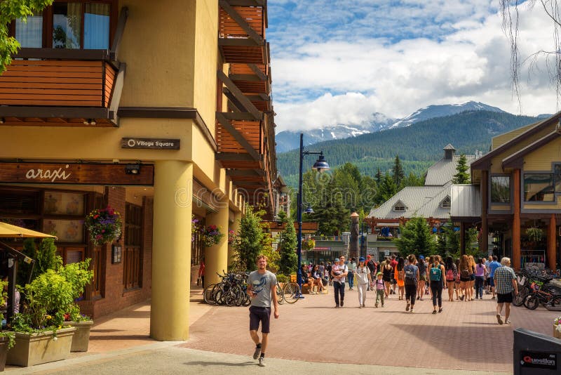 Street view with many tourists in Whistler Village stock photos Street view with many tourists in Whistler Village stock photos