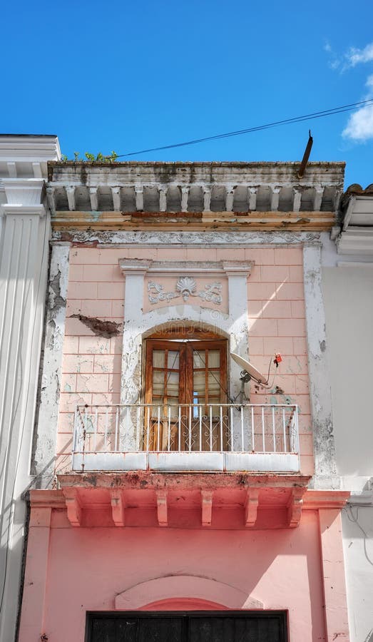 Street view of an old building facade in Otavalo, Ecuador stock photography