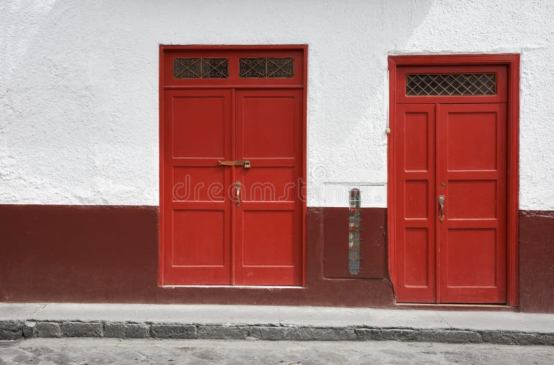 Street view of an old colonial building facade, Cuenca, Ecuador royalty free stock image