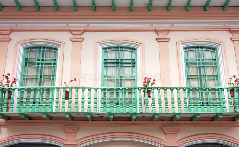 Street view of an old colonial building facade, Cuenca, Ecuador stock images