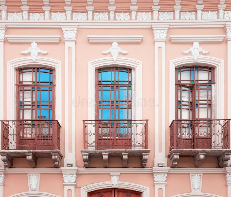 Street view of an old colonial building facade, Cuenca, Ecuador royalty free stock images