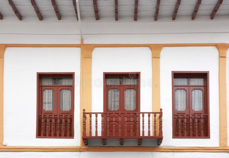 Street view of an old colonial building facade, Cuenca, Ecuador stock photo
