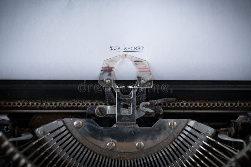 Streng geheim geschrieben auf Schreibmaschine lizenzfreies stockfoto Streng geheim geschrieben auf Schreibmaschine lizenzfreies stockfoto
