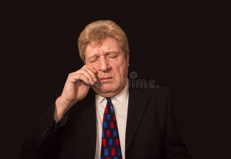 Stressade höga caucasian affärsmangnuggbildögon arkivbild Stressade höga caucasian affärsmangnuggbildögon arkivbild