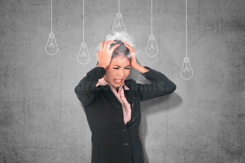 Stressed asian business woman thinking for new creative idea with light bulb hanging stock image Stressed asian business woman thinking for new creative idea with light bulb hanging stock image
