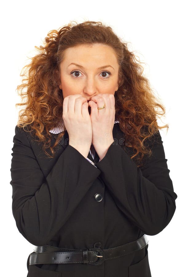 Stressed business woman biting nails royalty free stock image