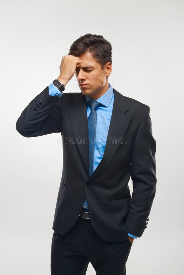 Stressed Businessman against white background royalty free stock photo