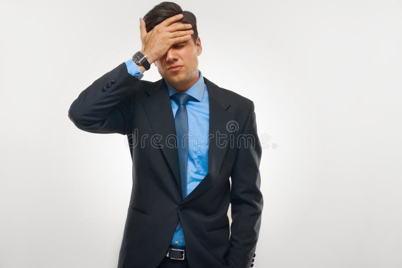 Stressed Businessman against white background royalty free stock image