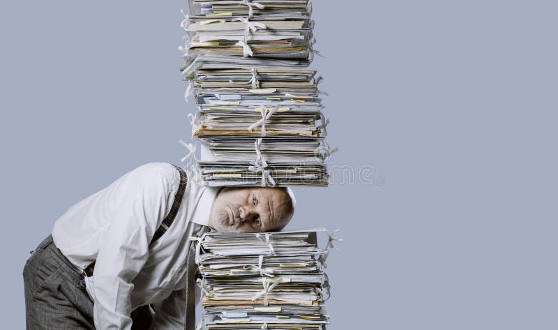 stressed-businessman-under-pile-paperwork-overwhelmed-work-197132413.jpg