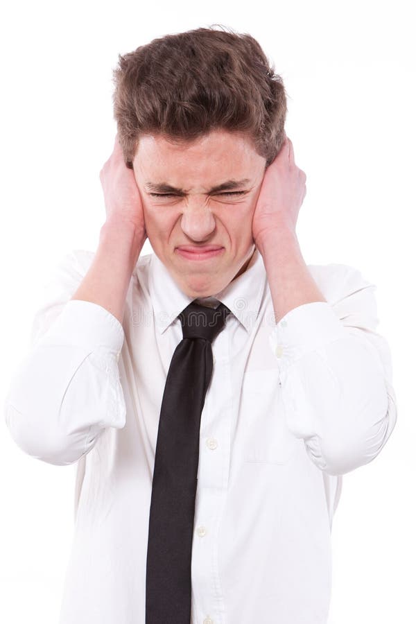 Stressed guy covering his ears, too much noise