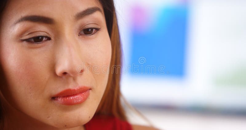 Stressed Japanese businesswoman royalty free stock images Stressed Japanese businesswoman royalty free stock images