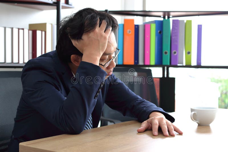 Stressed Overworked Young Asian Business Man With Hands On Face Feeling