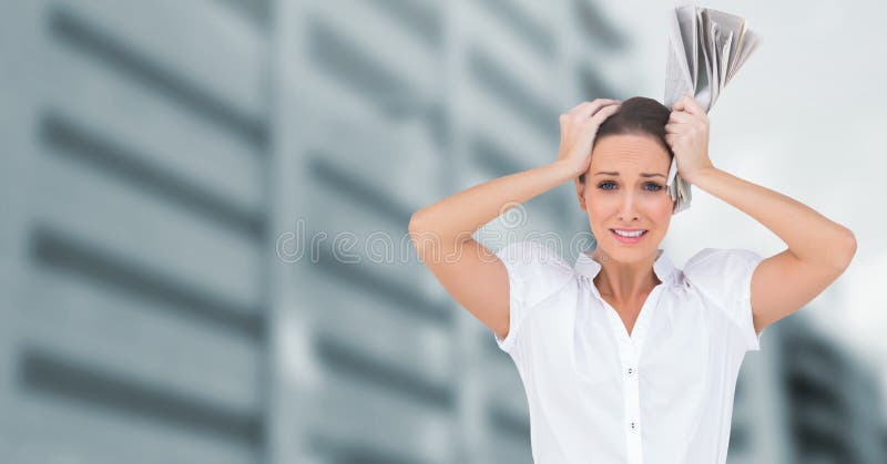 Stressed woman in front of tall buildings royalty free stock image Stressed woman in front of tall buildings royalty free stock image
