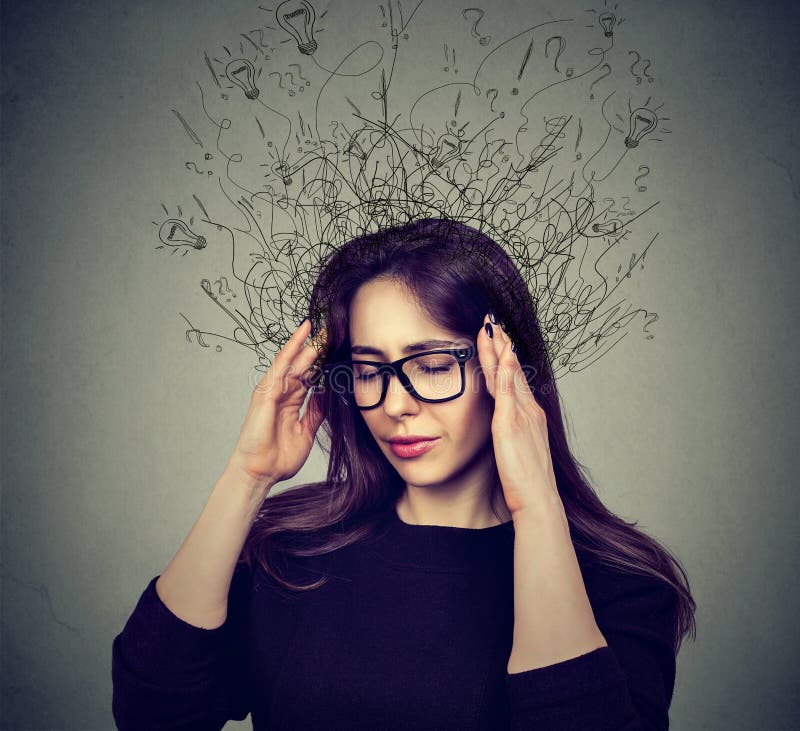 Stressed woman having headache with worried face expression and brain melting into many lines question marks. royalty free stock photo Stressed woman having headache with worried face expression and brain melting into many lines question marks. royalty free stock photo