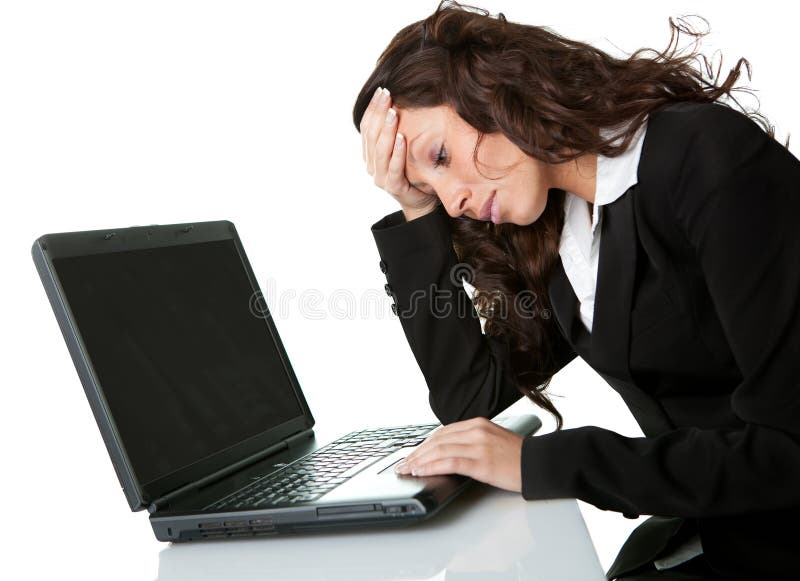 Stressful business woman working on laptop royalty free stock image Stressful business woman working on laptop royalty free stock image
