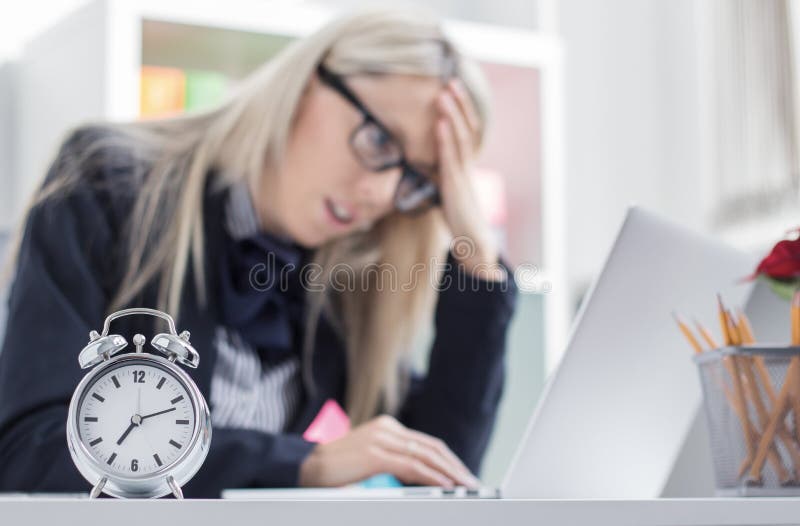 Stressful woman can't finish job on time stock photography Stressful woman can't finish job on time stock photography