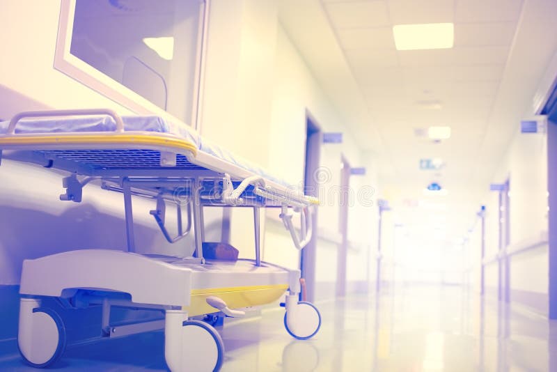 Stretcher in the empty hospital corridor ending with a flash of royalty free stock photography