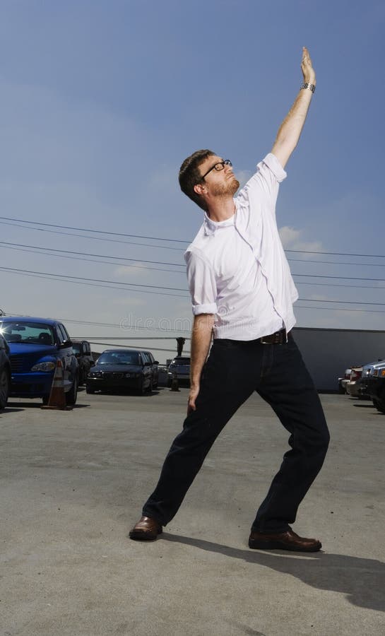 Stretching on top of the parking lot