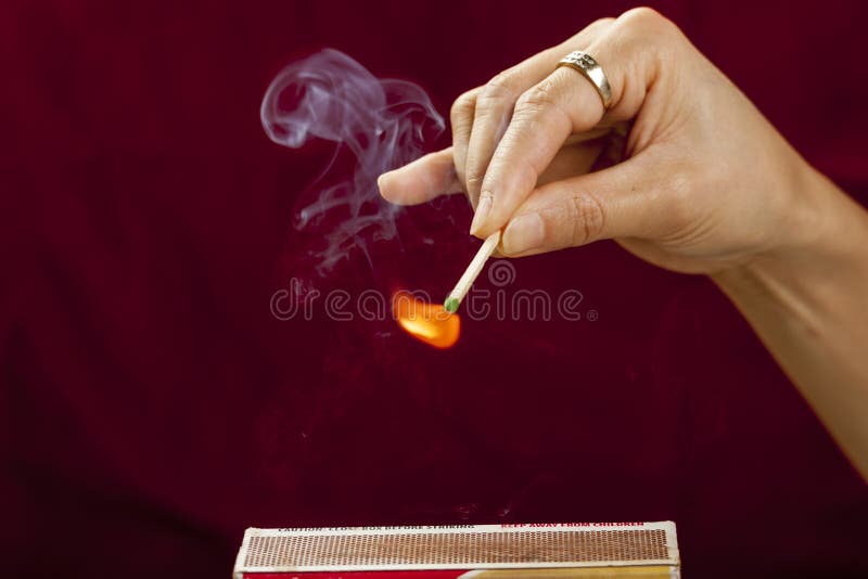 Striking a match stock image. Image of ignite, matchbook 1958375