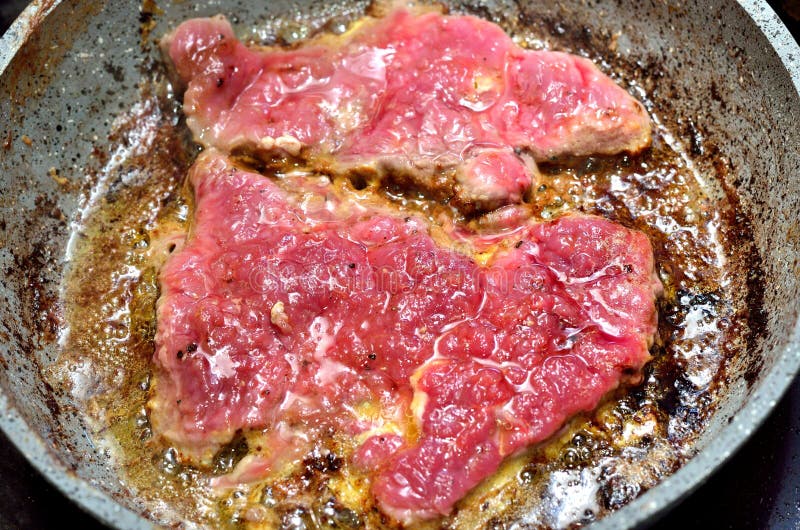 Strip Steak on a Pan stock image. Image of butcher, dinner 57000735