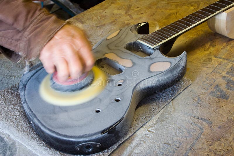 Stripping a guitar finish stock photo. Image of shop 140325340