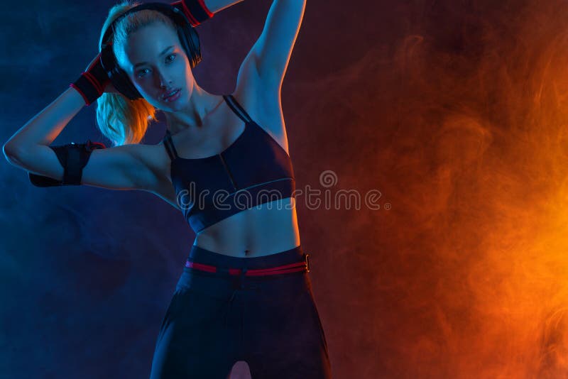 A Strong Athletic Woman on Black Background Wearing in White Sportswear,  Fitness and Sport Motivation. Sport Concept Stock Image - Image of banner,  model: 108184351