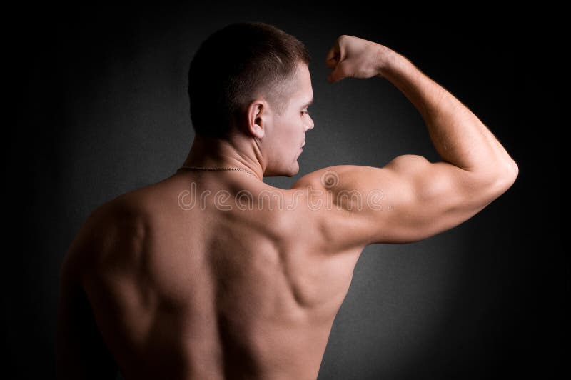 Strong athletic man stock photo. Image of bodybuilder 20036670