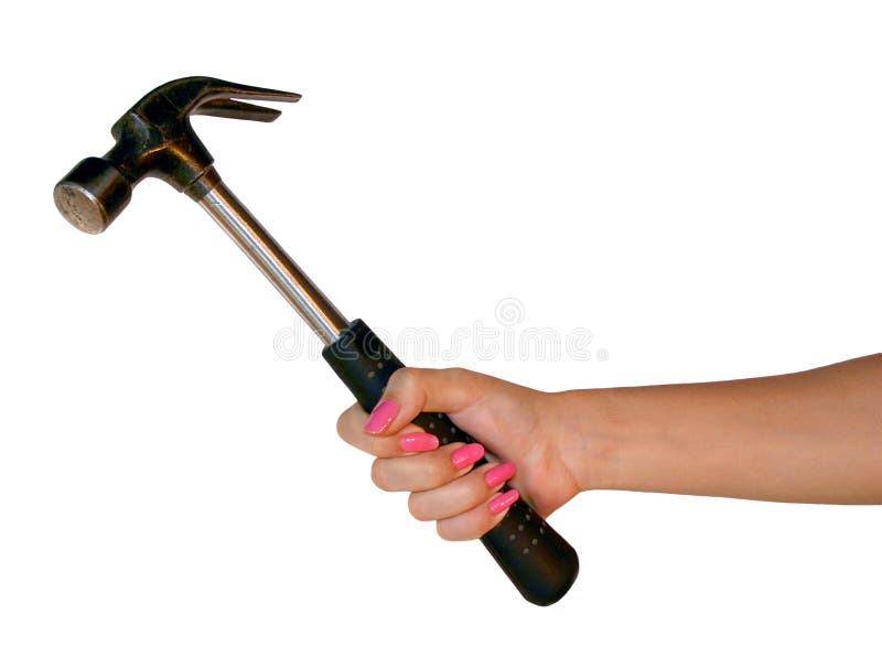 The big black hammer in a hand of the girl. Her long nails are pink. Isolated on a white background. The big black hammer in a hand of the girl. Her long nails are pink. Isolated on a white background.