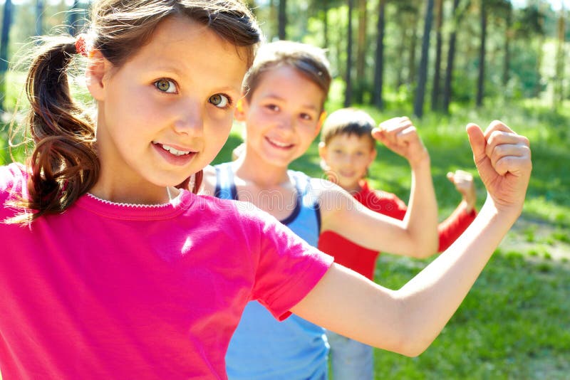 Three little children posing at camera. Three little children posing at camera