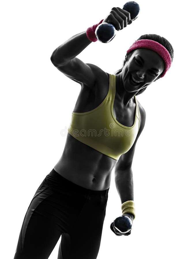 Strong happy woman exercising fitness workout silhouette stock photo Strong happy woman exercising fitness workout silhouette stock photo