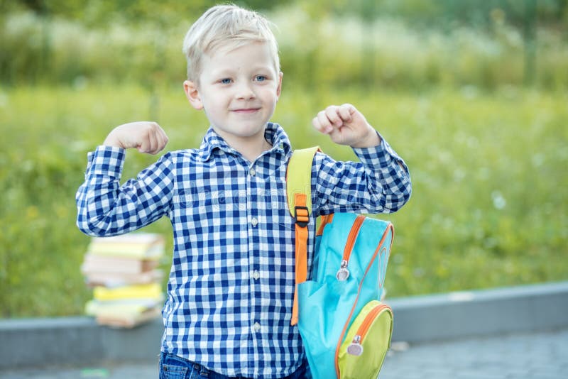 A Strong Schoolboy Stands with a Backpack. the Concept of Learning ...