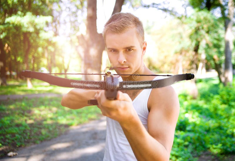 Strong young men with arbalest