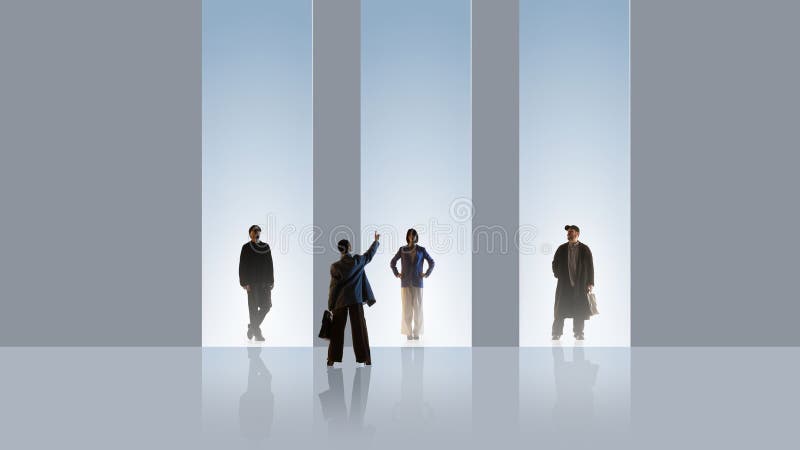 Structured composition of professionals standing inside vertical light frames stock photography