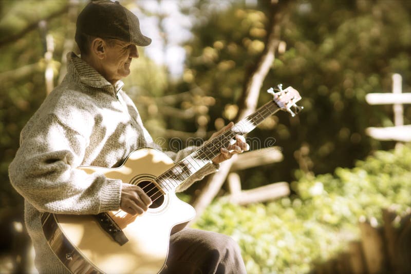 Download Strumming Guitar In Afternoon Light Stock Photo - Image of healthy, duckbill: 61199774