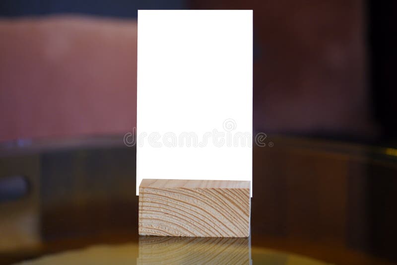 Menu frame standing on wood table in Bar restaurant cafe. space for text marketing promotion - Image. Menu frame standing on wood table in Bar restaurant cafe. space for text marketing promotion - Image